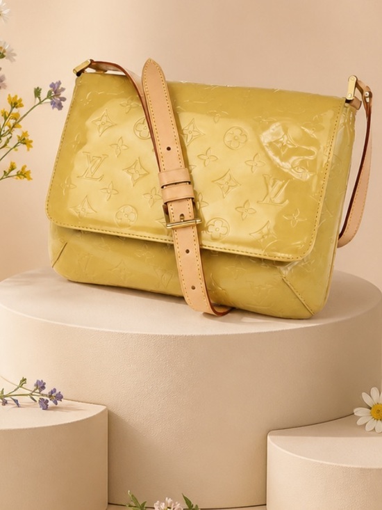 Louis Vuitton Handbags - Authentic Louis Vuitton Vernis Thompson Shoulder Bag with Classic Design.